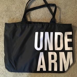 Brand new Under Armour bag and matching wristlet!